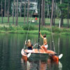 couple in a boat on the lake